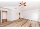 Spacious bedroom with vaulted ceiling, hardwood floors and doorway to bathroom at 7242 River Glen Dr, Fishers, IN 46038
