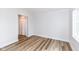 Bedroom with wood-look flooring and closet at 7242 River Glen Dr, Fishers, IN 46038