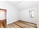 Vaulted ceiling and hardwood floors are the highlight of this simply decorated bedroom at 7242 River Glen Dr, Fishers, IN 46038