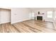 Living room features hardwood flooring, fireplace, and natural lighting at 7242 River Glen Dr, Fishers, IN 46038