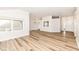 Open-concept living space with hardwood floors and natural light throughout at 7242 River Glen Dr, Fishers, IN 46038