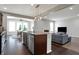 Modern kitchen island featuring stainless steel appliances and an open-concept layout at 7736 Eagle Point Cir, Zionsville, IN 46077