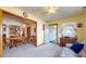 Inviting dining area featuring wood furniture, access to the patio, and seamless transition to the living room at 8142 Bentley Farms Dr, Indianapolis, IN 46259
