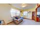 Cozy living room featuring a comfortable sofa, natural light, and classic decor creating a relaxing atmosphere at 8142 Bentley Farms Dr, Indianapolis, IN 46259