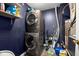Efficient laundry room equipped with stacked washer and dryer at 8810 Yardley Ct # 208, Indianapolis, IN 46268