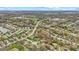 Aerial view showing the neighborhood with tree-lined streets and nearby amenities at 9448 Burrwood Cir, Indianapolis, IN 46235