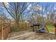 Wooden back deck with grill, perfect for outdoor entertaining at 9448 Burrwood Cir, Indianapolis, IN 46235