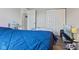 View of a bedroom with comfortable furnishings and a television at 9448 Burrwood Cir, Indianapolis, IN 46235