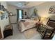 Bedroom with a floral bedspread and a rocking chair at 1066 Woodridge, Brownsburg, IN 46112