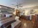 Bright bedroom with a ceiling fan, wood-look floors, and earth-toned accents at 1066 Woodridge, Brownsburg, IN 46112
