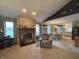 Inviting living room features a stone fireplace and flows into the dining and kitchen areas at 1066 Woodridge, Brownsburg, IN 46112
