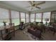 Cozy sunroom filled with natural light, perfect for relaxing or casual dining at 1066 Woodridge, Brownsburg, IN 46112