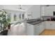 Bright breakfast nook with stainless sink and views to the backyard at 10875 Santa Anita Ct, Carmel, IN 46280