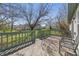 Outdoor deck with comfortable seating perfect for enjoying the surrounding landscape at 10875 Santa Anita Ct, Carmel, IN 46280