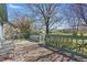 Relaxing outdoor deck features patio furniture and backyard views at 10875 Santa Anita Ct, Carmel, IN 46280