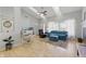 Inviting living room boasting vaulted ceilings, a cozy fireplace, and ample natural light at 10875 Santa Anita Ct, Carmel, IN 46280
