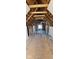 An attic is under construction with exposed rafters, adding character to the space at 116 N Vine St, Shelbyville, IN 46176