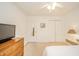 Bedroom featuring white walls, neutral carpet, closet, and simple decor at 12319 Wolf Run Rd, Noblesville, IN 46060