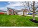Beautiful home with brick and siding, a well-maintained lawn, and a charming front entrance at 12319 Wolf Run Rd, Noblesville, IN 46060
