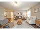 Cozy living room with a neutral palette, comfortable furnishings, and seamless flow into adjacent rooms at 12319 Wolf Run Rd, Noblesville, IN 46060