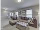 Spacious living room area with carpet flooring and large windows at 1232 Blue Haven Way, Greenwood, IN 46143