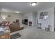 Open living room with carpet flooring and a cozy seating area at 1232 Blue Haven Way, Greenwood, IN 46143