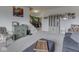 Spacious living area featuring neutral walls, stylish furniture, and a charming display cabinet at 1232 Blue Haven Way, Greenwood, IN 46143