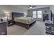 Bright main bedroom with large windows and a comfortable bed at 1232 Blue Haven Way, Greenwood, IN 46143