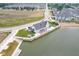 Aerial view of clubhouse with lake access and beach front and walking trails at 13107 Pennington Rd, Fishers, IN 46037