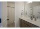 Well-lit bathroom featuring a modern vanity with a white countertop and a framed mirror at 13107 Pennington Rd, Fishers, IN 46037