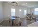 Bright living area with contemporary furnishings, wood floors, and natural light at 13107 Pennington Rd, Fishers, IN 46037