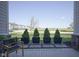 Charming porch with decorative plants and comfortable outdoor seating at 13107 Pennington Rd, Fishers, IN 46037