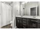 Functional bathroom with a double vanity, white shower curtain, and classic fixtures at 1401 Farmhouse Dr, Westfield, IN 46074