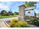 Elegant community sign showcases stone details, manicured landscaping, and a welcoming atmosphere at 1401 Farmhouse Dr, Westfield, IN 46074