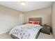 Bedroom with neutral walls, modern bed frame, and sleek nightstands, creating a serene space at 14059 Knightstown E Dr, Carmel, IN 46033