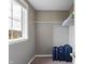 Empty walk-in closet with window, rod, and space for ample storage for clothes and suitcases at 14059 Knightstown E Dr, Carmel, IN 46033