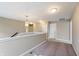 Spacious loft area with neutral carpet and ample lighting, ideal for a versatile living space at 14059 Knightstown E Dr, Carmel, IN 46033