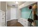 Welcoming mudroom with a storage bench, coat rack, and modern finishes, maximizing storage at 14059 Knightstown E Dr, Carmel, IN 46033