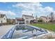 Large backyard with a covered pool, patio, grill, and plenty of green space surrounded by fences at 1458 Longleaf St, Avon, IN 46123