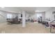 Large finished basement with ample room for entertaining and fitness activities at 1458 Longleaf St, Avon, IN 46123