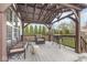 Outdoor deck featuring patio furniture, a grill, and a covered seating area at 1458 Longleaf St, Avon, IN 46123
