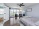 Spacious main bedroom with abundant natural light, hardwood floors, and neutral decor at 1458 Longleaf St, Avon, IN 46123