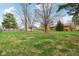 The home has a lush backyard, offering a private and serene outdoor space for relaxing or entertaining at 1526 Chapman Dr, Greenfield, IN 46140