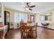 Charming dining room featuring hardwood floors, ample natural light, and a cozy atmosphere at 1526 Chapman Dr, Greenfield, IN 46140