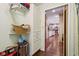 Hallway view of the kitchen from the laundry area at 1526 Chapman Dr, Greenfield, IN 46140