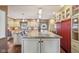 Updated kitchen with a large central island, pendant lighting, and an abundance of counter space at 1526 Chapman Dr, Greenfield, IN 46140