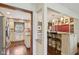 Partial view of the kitchen showing granite counters and breakfast bar at 1526 Chapman Dr, Greenfield, IN 46140