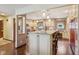 Spacious kitchen featuring a large island with bar seating, granite countertops, and stainless steel appliances at 1526 Chapman Dr, Greenfield, IN 46140