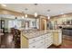 Bright kitchen with stainless steel appliances, granite countertops, and ample cabinet space at 1526 Chapman Dr, Greenfield, IN 46140