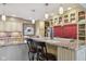 Large kitchen featuring a central island with seating, granite countertops, and stainless steel appliances at 1526 Chapman Dr, Greenfield, IN 46140